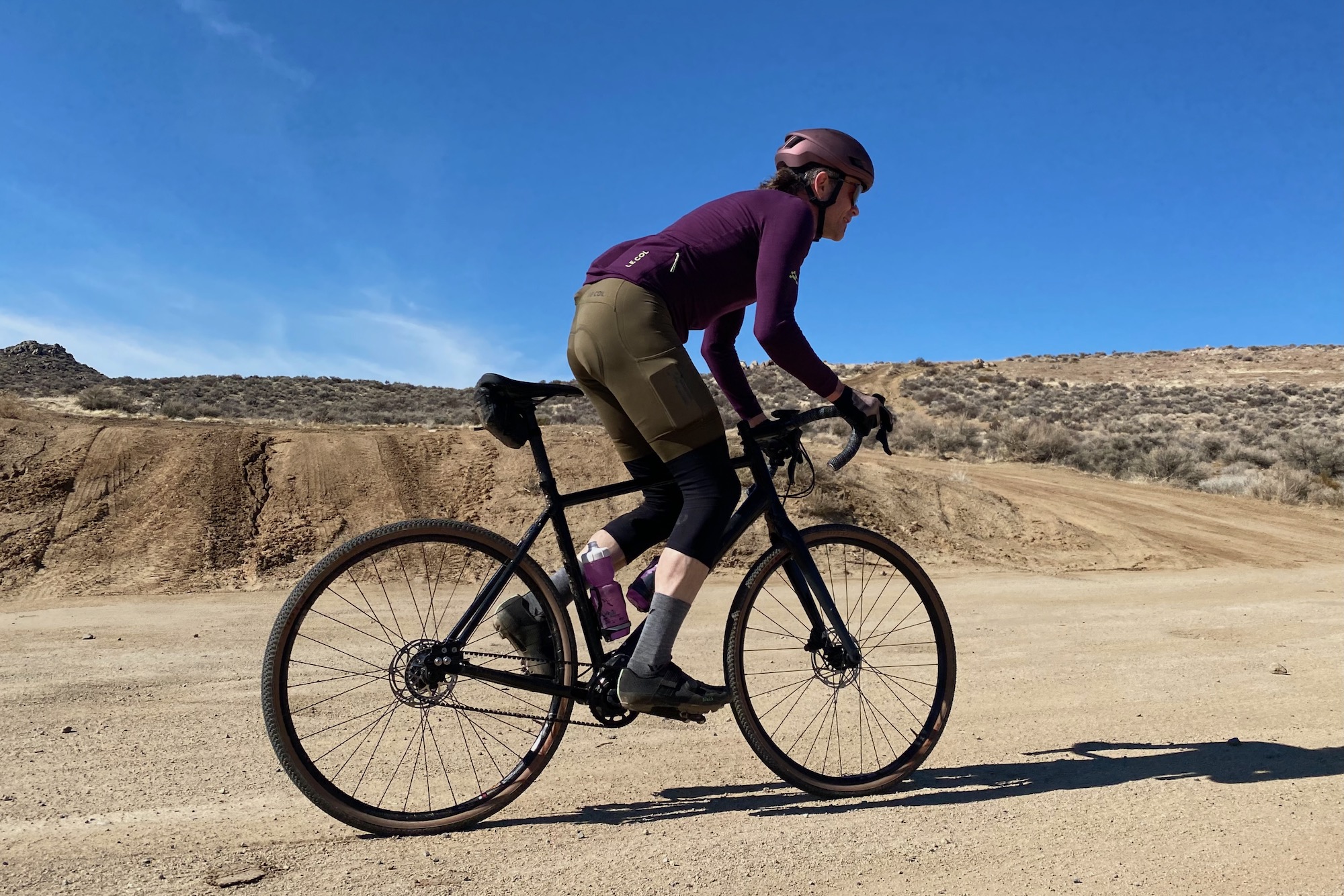 Climbing up a gravel road while testing the Priority Gemini gravel bike